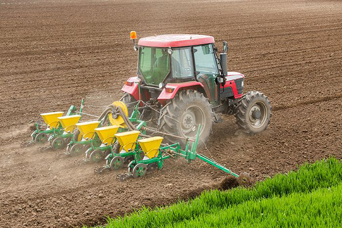Tractor sowing seeds