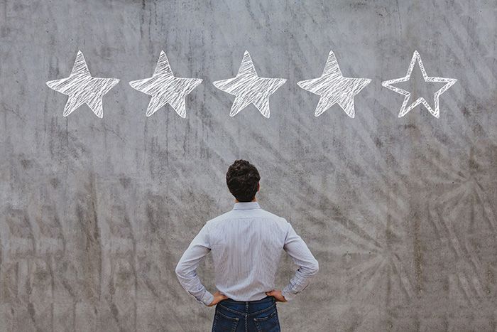 Man reviewing online ratings