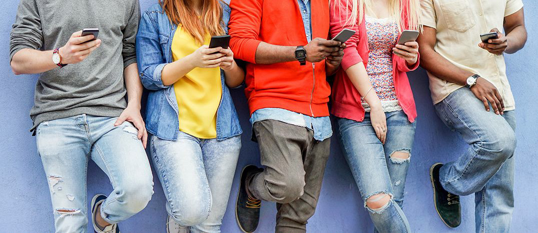 Group with using their cellphones