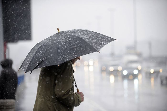 Image: man with umbrella