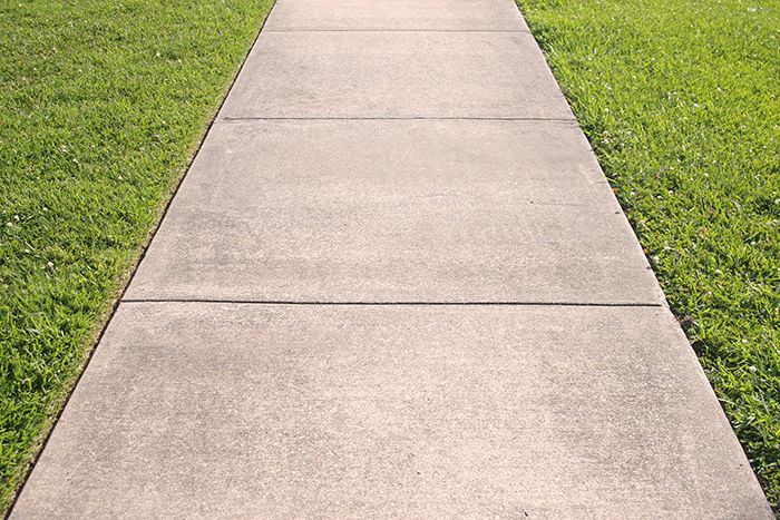 Image of a sidewalk and grass