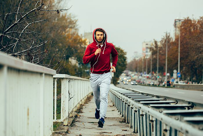 Image of young man jogging