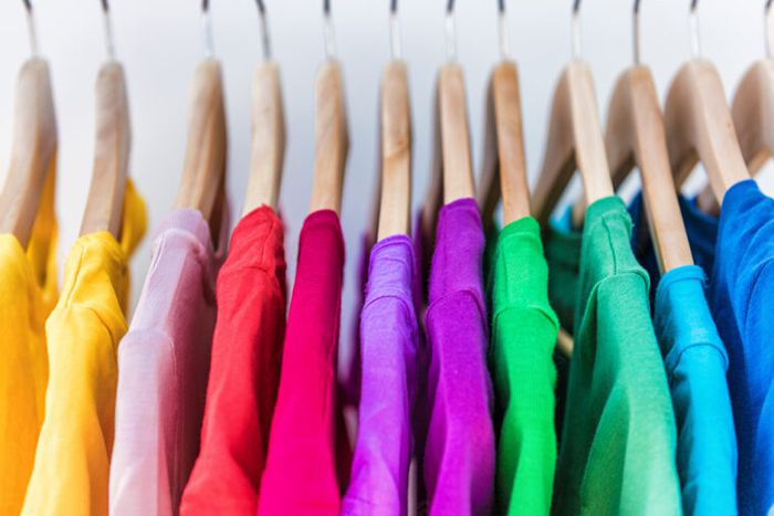 Image: Colorful jerseys on a clothing rack