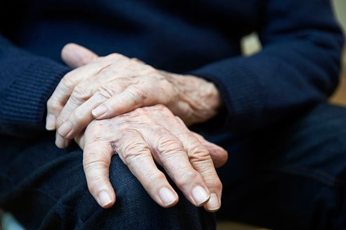 Image of an elderly man's hands