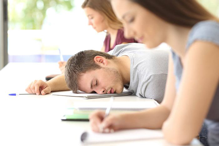 Image: Student sleeping during exam