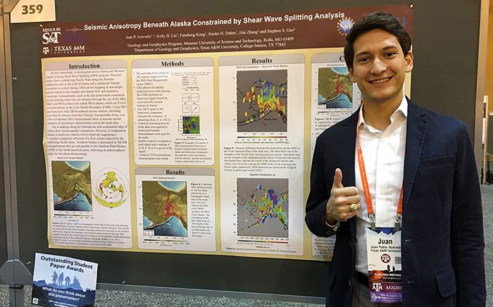 Juan Acevedo with his research poster