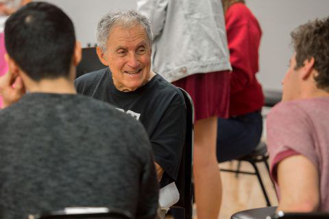 Matthew Wolfson, 81, talks with Andrew Jiang and London Brand. (USC Photo/Gus Ruelas)