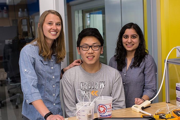 Photo of undergraduate students Monica Rex, Ben Lee, and Sonia Trukru.