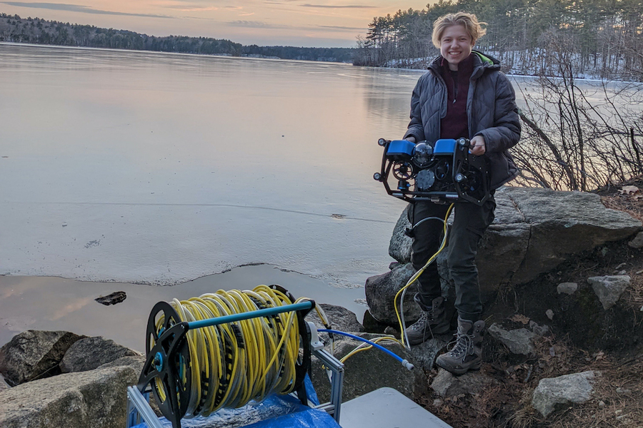 "Responsive Design Meets Responsibility for the Planet’s Future; To determine the greenhouse gas emissions from thawing permafrost, MIT senior Sylas Horowitz has been developing a high-performance, remotely operated vehicle (ROV) that can collect water samples from beneath a sheet of Arctic ice. Here, Horowitz field tests the Arctic ROV at Lake Whitehall, Massachusetts."