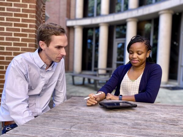 Researchers at UNC Study Drug Resistance to Malaria in the Democratic Republic of the Congo; Jonathan Parr, MD, MPH, assistant professor in infectious disease, with Ruthly François, an epidemiology doctoral student.