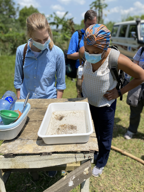 "Researchers at UNC Study Drug Resistance to Malaria in the Democratic Republic of the Congo; pidemiology PhD student colleague Rachel Sendor and Ruthly François observe mosquito larvae collected by the Kinshasa entomology team."