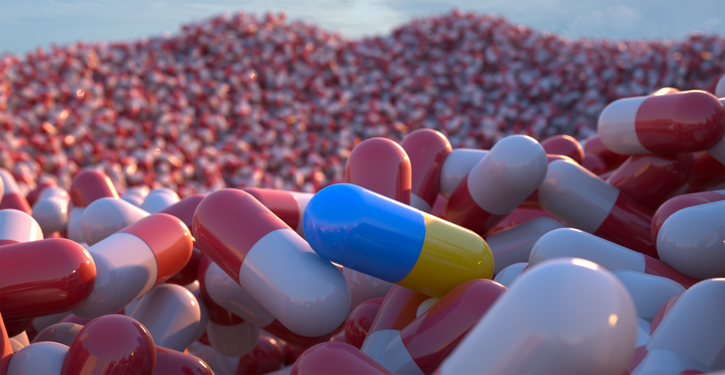 New Test Reveals Existing Antibiotics, Hiding in Plain Sight on Pharmacy Shelves, Can Cure Superbugs; Pictured is a digital illustration of a vast  landscape of pill capsules