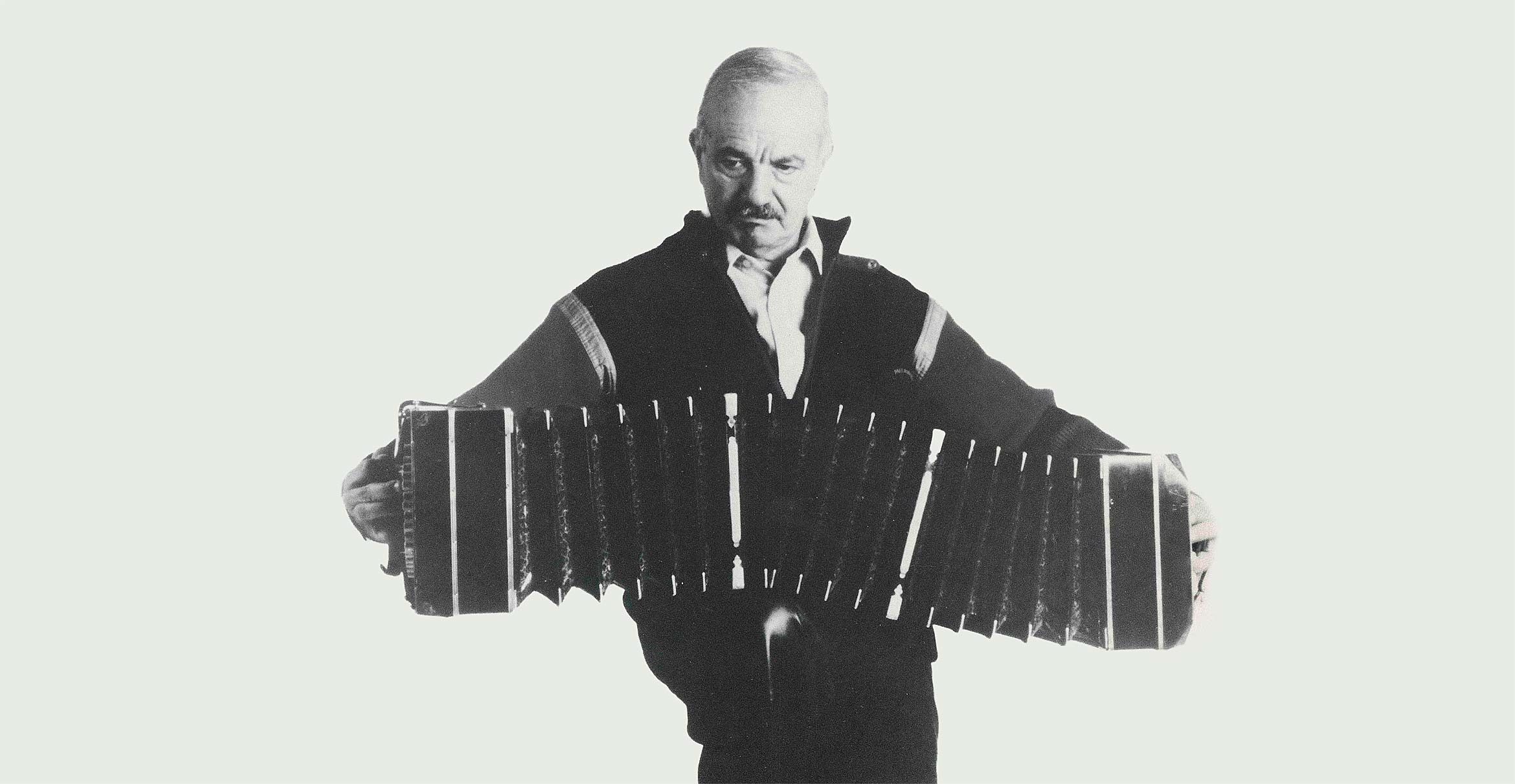Vast tango archive of Argentine composer Astor Piazzolla funded for preservation; Photo: Astor Piazzolla playing the bandoneón"