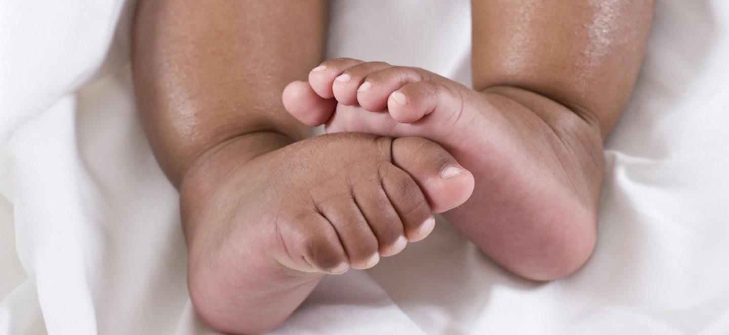 1 in 5 Adults Don’t Want Children — and They Don’t Regret It Later; Stock image of a baby's feet