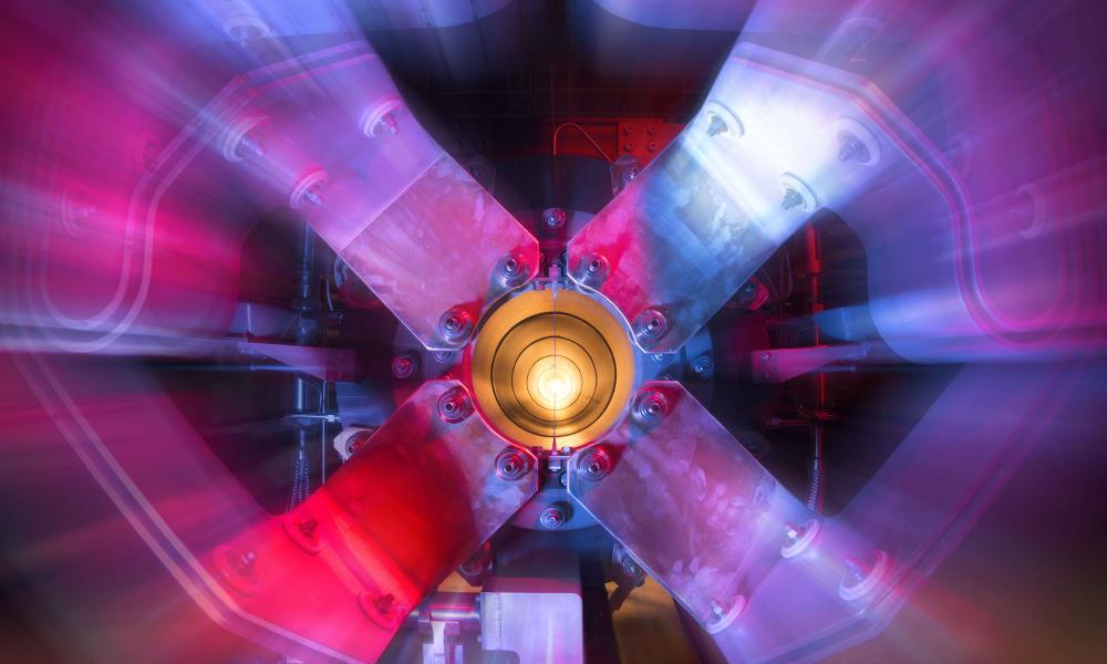 "‘Ghostly’ neutrinos provide new path to study protons; Stylized picture of particle accelerator at Fermilab"