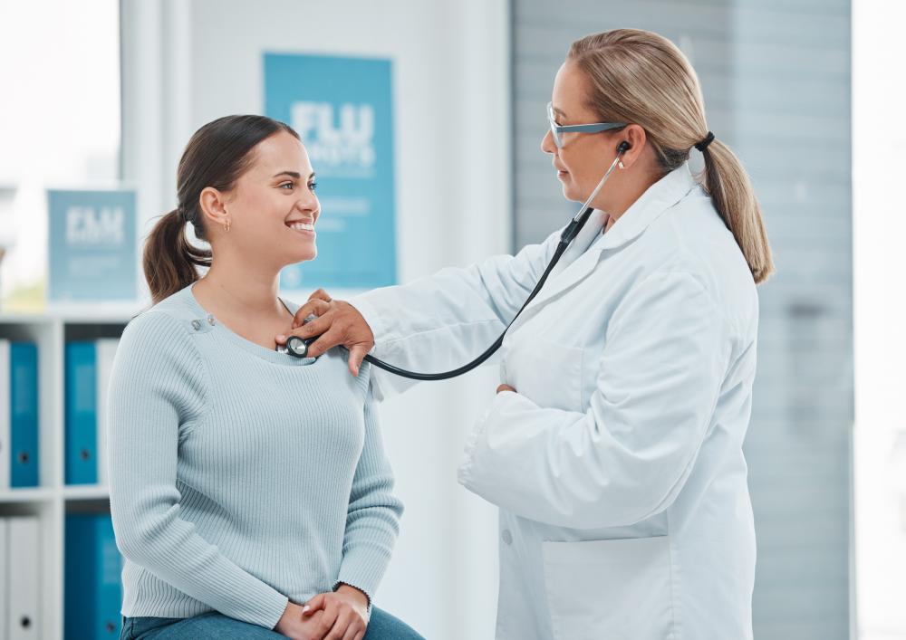 "New Grant Allows Researchers to Examine the Genetic Underpinnings of Heart Attack and Stroke in Hispanic Populations; Stock photo of a doctor examining a patient with a stethoscope