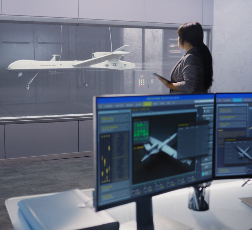 Engineer in an aerodynamics lab testing a drone