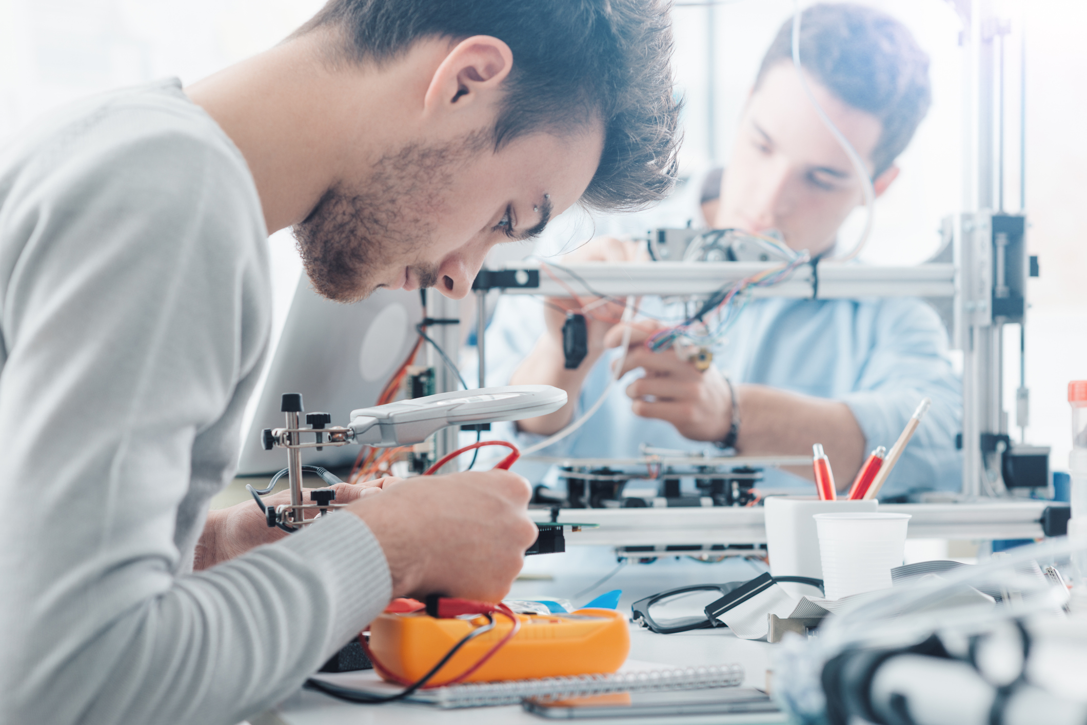 Engineering students working in a lab. 