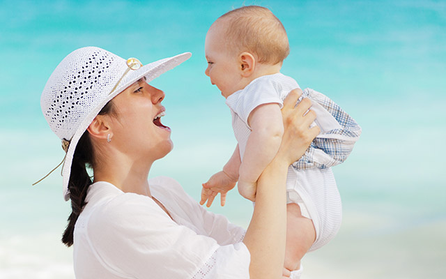A mother and an infant. When mothers talk, are infants with ASD listening?