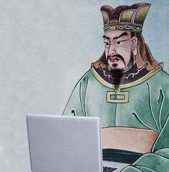 Image: Sun Tzu seated at a lap top computer