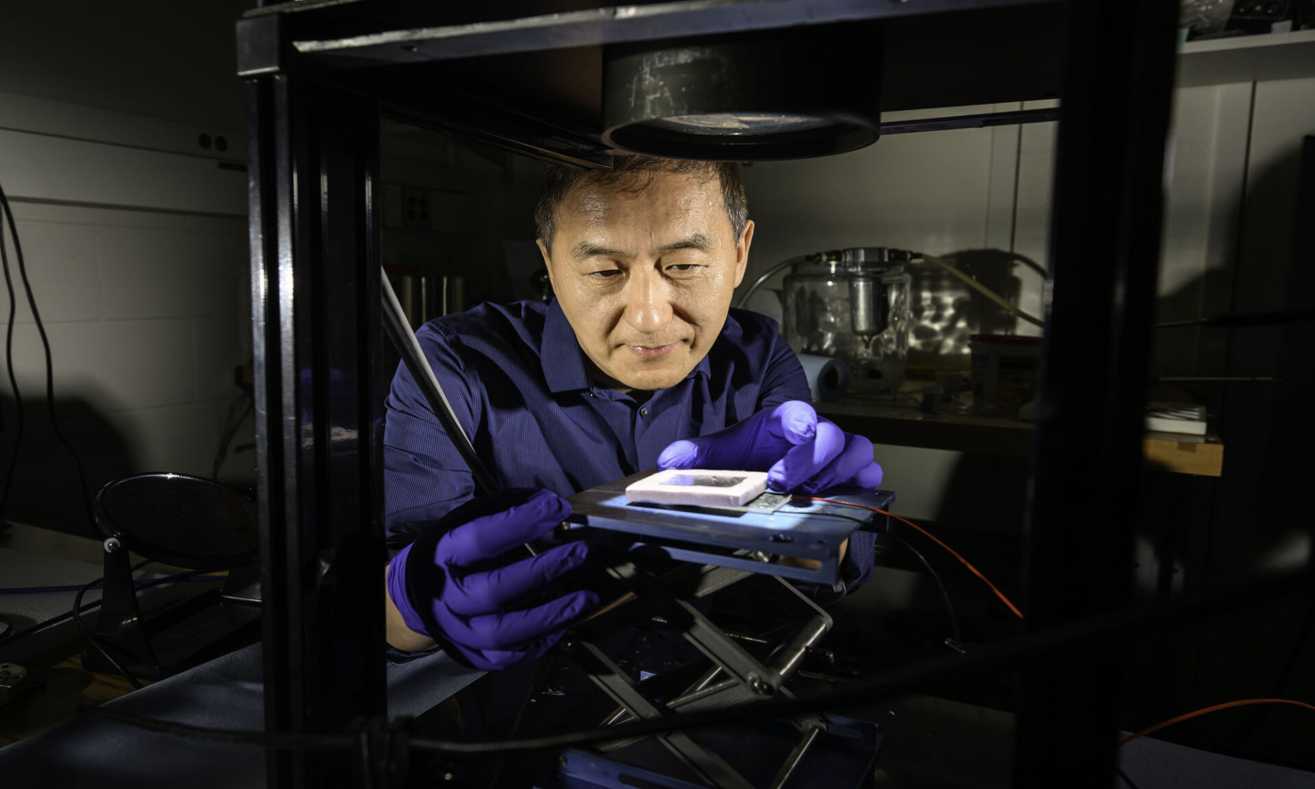 Researcher Chunlei Guo tests a solar thermoelectric generator