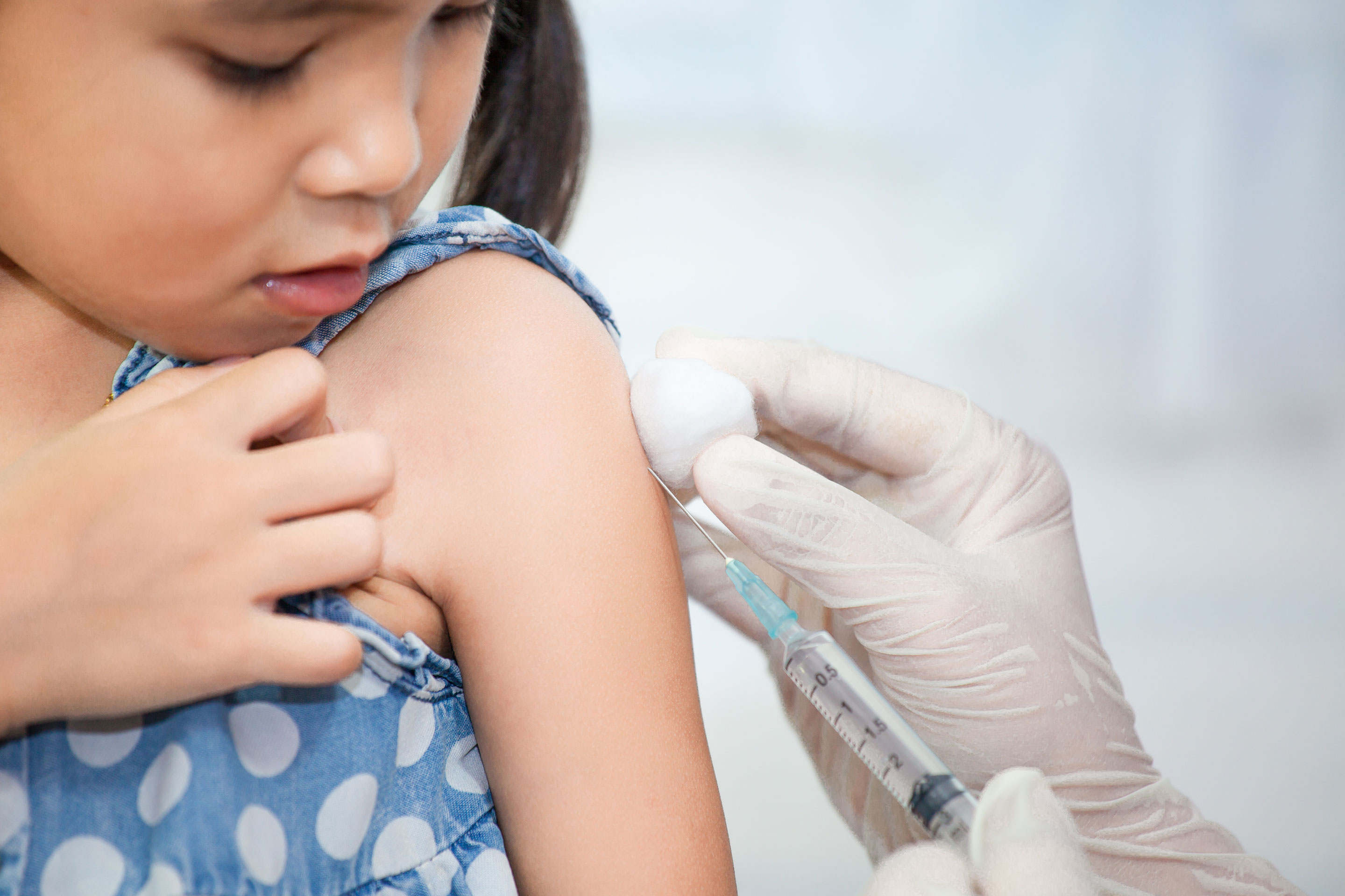 Child getting flu shot