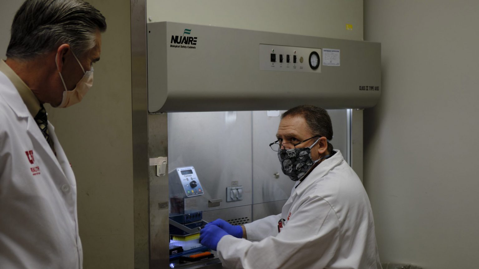 A researcher conducts a test at a lab.
