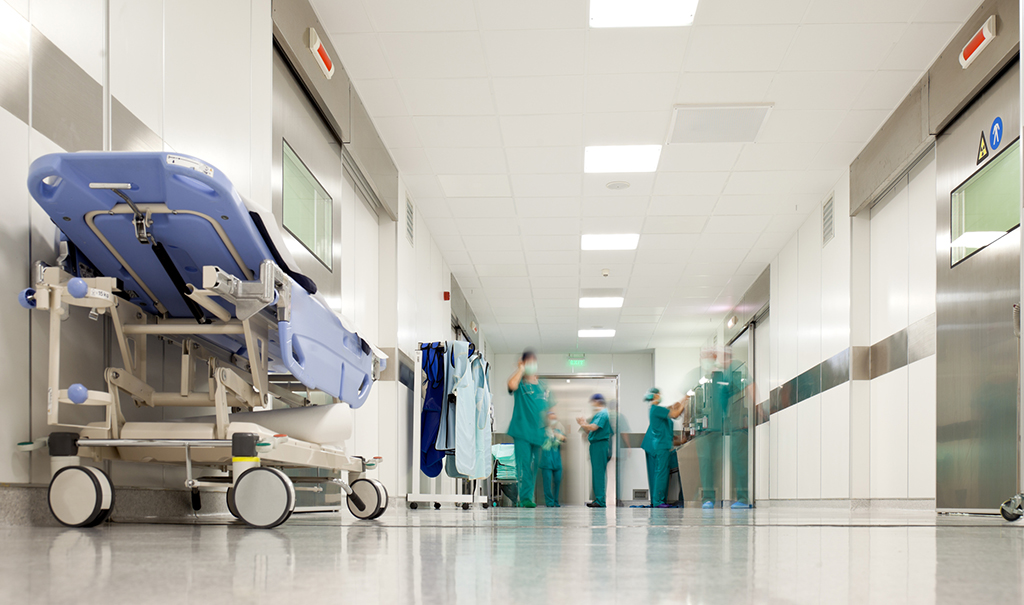 A view of a hospital hallway from the ground.