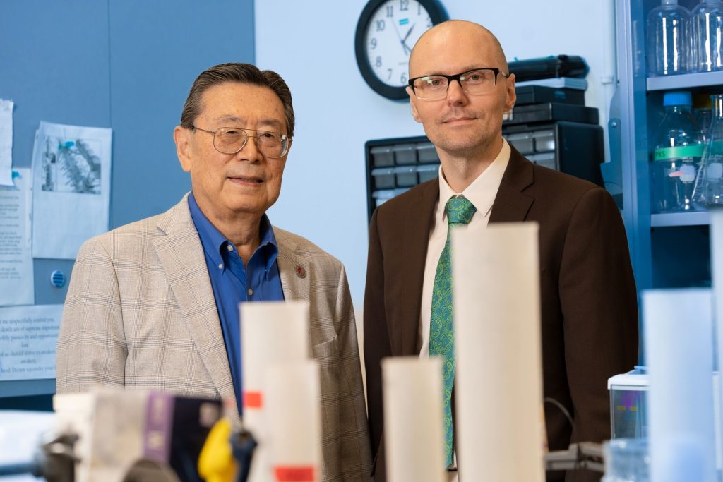 Iwao Ojima (left) and Martin Kaczocha in a Stony Brook University laboratory.