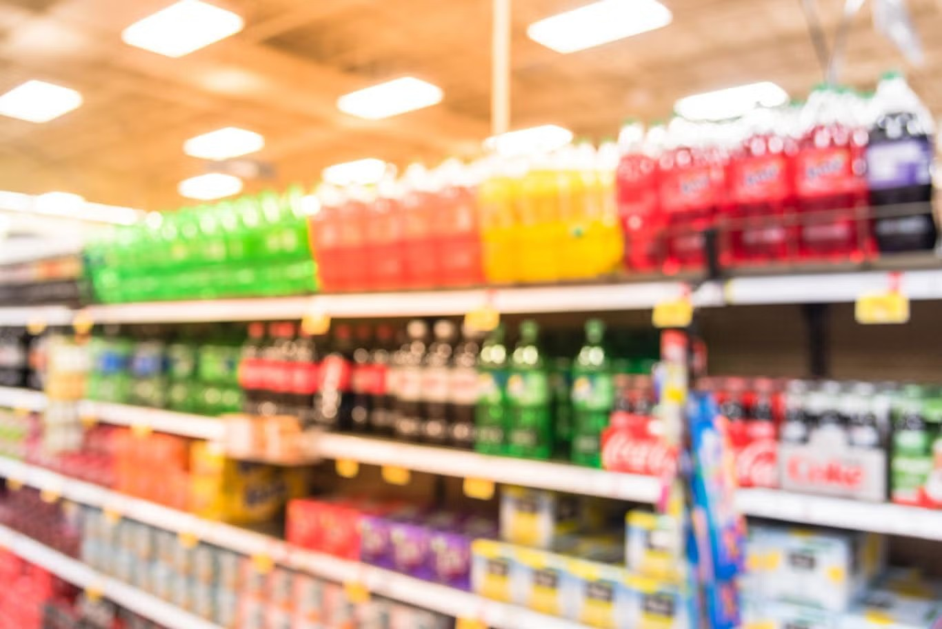 Grocery store aisle of suggary soda drinks