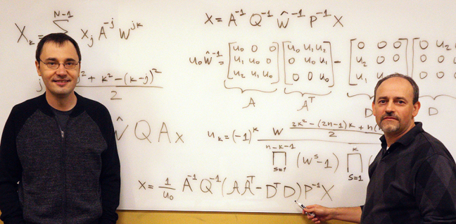 Vladimir Sukhoy and Alexander Stoytchev, left to right, with the derivation for the ICZT algorithm in structured matrix notation.