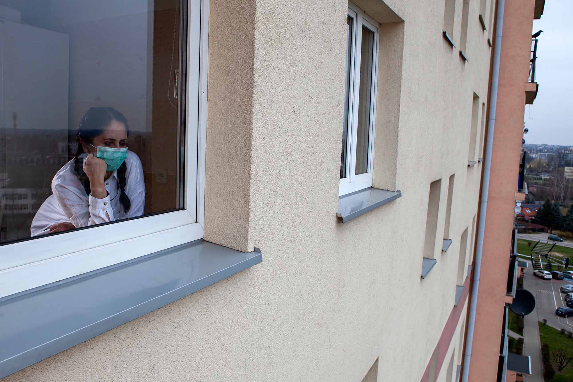 girl staring out of window