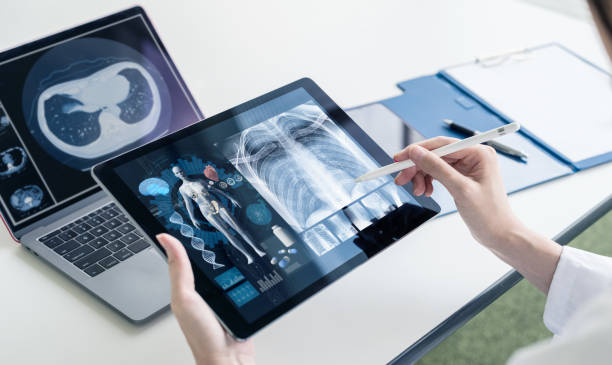 Radiologist reviewing breast-cancer screenings