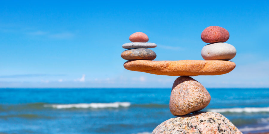 Rocks balancing on top of other rocks which are also balanced on rocks.