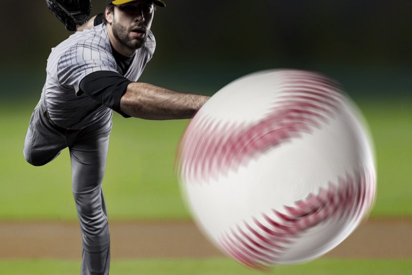 Pitcher throws baseball