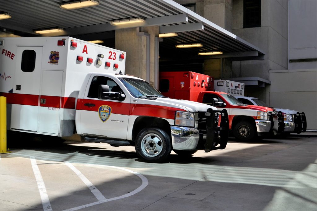 Ambulances wait to be called to duty.