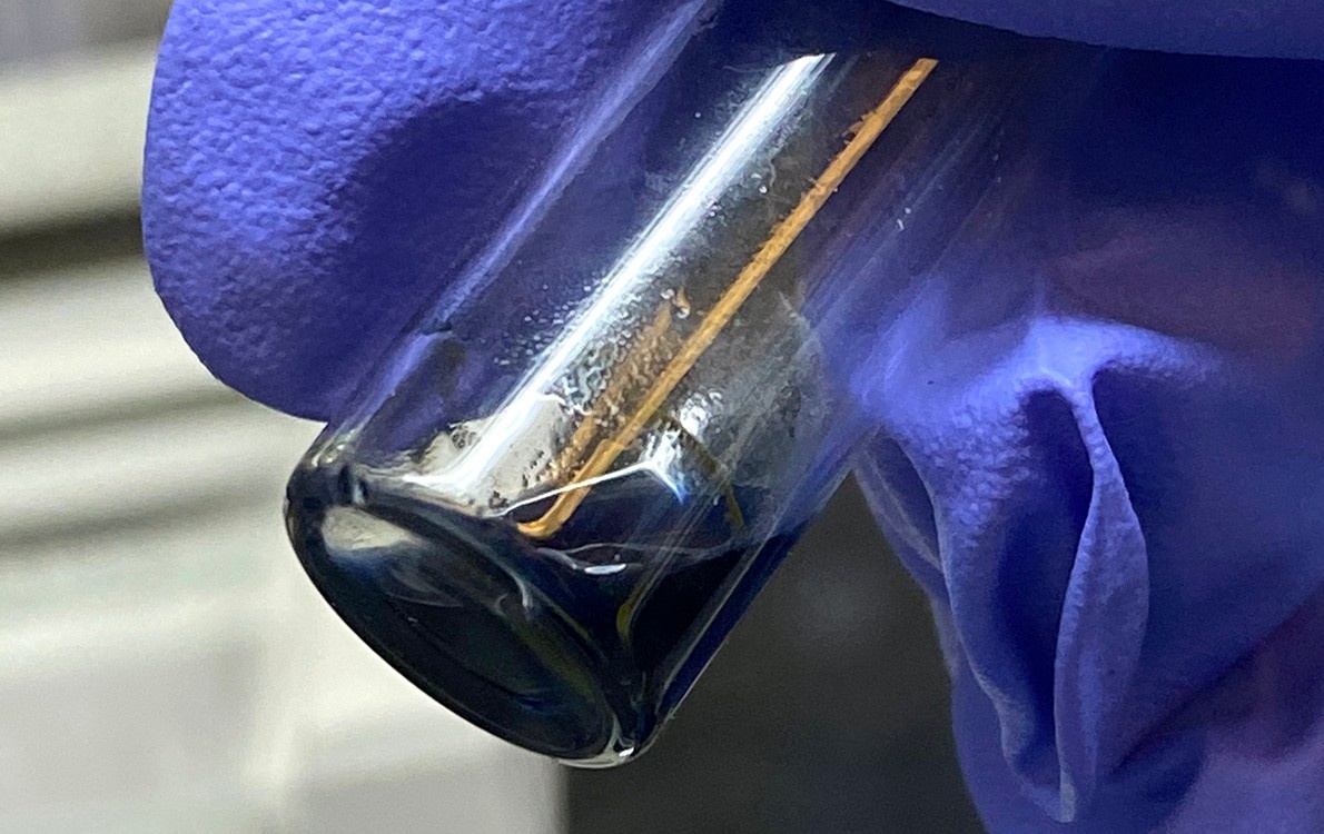 Vial of newly discovered heavy-metal molecule berkelocene