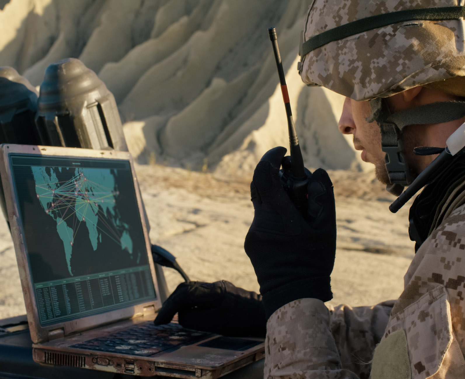 Soldier in combat using laptop