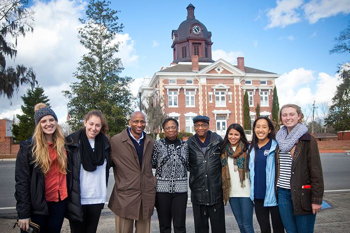 Emory University students Ellie Studdard and Emily Gaines; Tony Williams, son of Dorothy Williams; Dorothy Williams; her husband, Sam Williams; and students Sarah Husain, Emily Li and Lucy Baker.