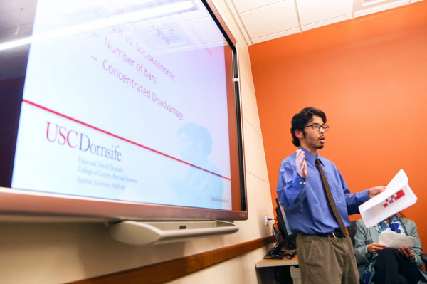 Postdoctoral Research Associate Noli Brazil with presentation