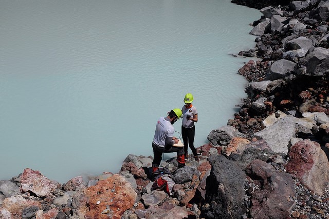 Researchers collect samples.