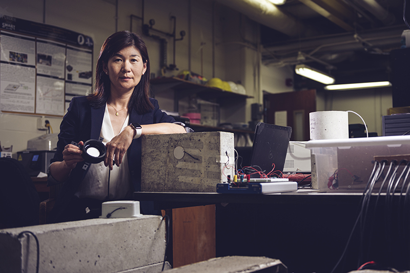 ‘Talking’ concrete could help prevent traffic jams and cut carbon emissions; Photo: Purdue University researcher Luna Lu