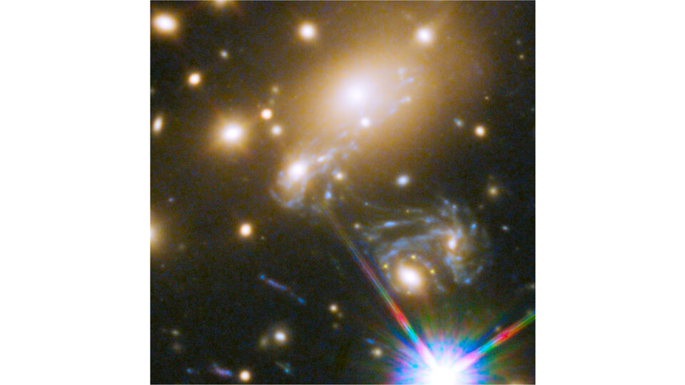 "Scientists Use New Technique to Measure Universe’s Expansion Rate; This image from the Hubble Space Telescope shows the galaxy cluster MACS J1149.5 +2233 and multiple appearances of Supernova Refsdal with time-delay positions. Credit: Patrick Kelly / NASA / ESA"