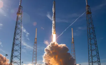 A SpaceX rocket launching into space.