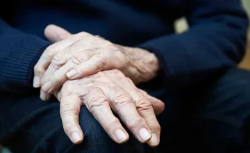Image of an elderly man's hands