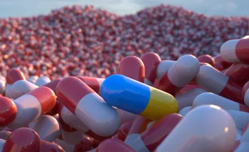 New Test Reveals Existing Antibiotics, Hiding in Plain Sight on Pharmacy Shelves, Can Cure Superbugs; Pictured is a digital illustration of a vast landscape of pill capsules