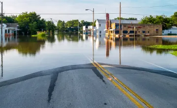 Carolina Researchers Examine New Construction in Floodplains; Photo of a flooded small town intersection