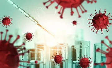 New Class of Drugs Could Be Therapeutic Against COVID-19 Variants; Scientist in laboratory study and analyze scientific sample of Coronavirus antibod