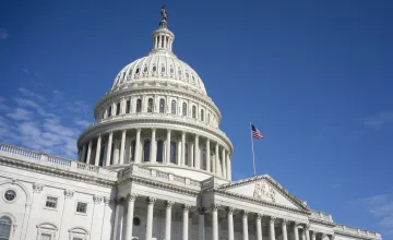 U.S. Capitol in Washington, DC on day with clear blue skies