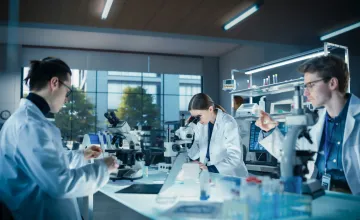 Team of university researchers in a laboratory